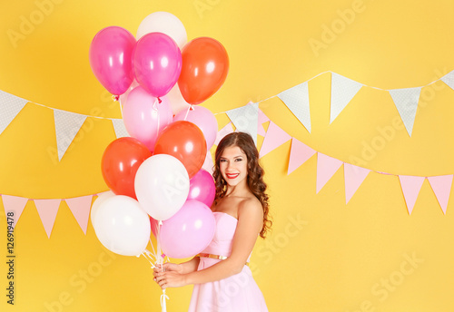 Beautiful young woman with ...