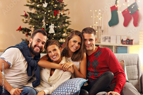 Group of friends celebrating Christmas