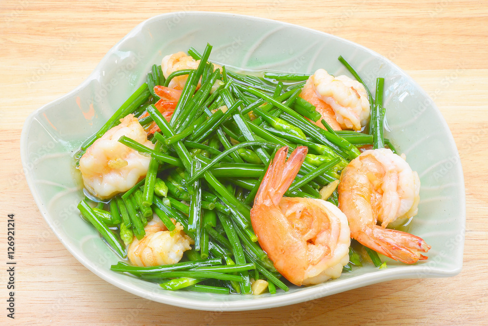 stir-fry flowering chinese chives with prawns stir-fry flowering chinese chives with prawns