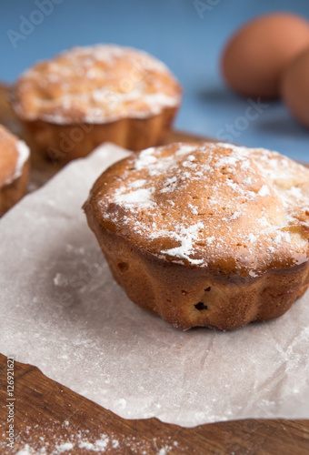 Fresh baked muffins  cakes  cupcakes for breakfast in a rural rustic style