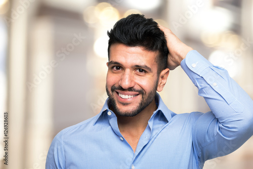 Tableau sur toile Man touching his hair