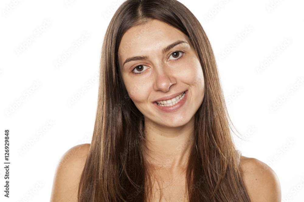 Beautiful smiling young woman without makeup Beautiful smiling young woman without makeup