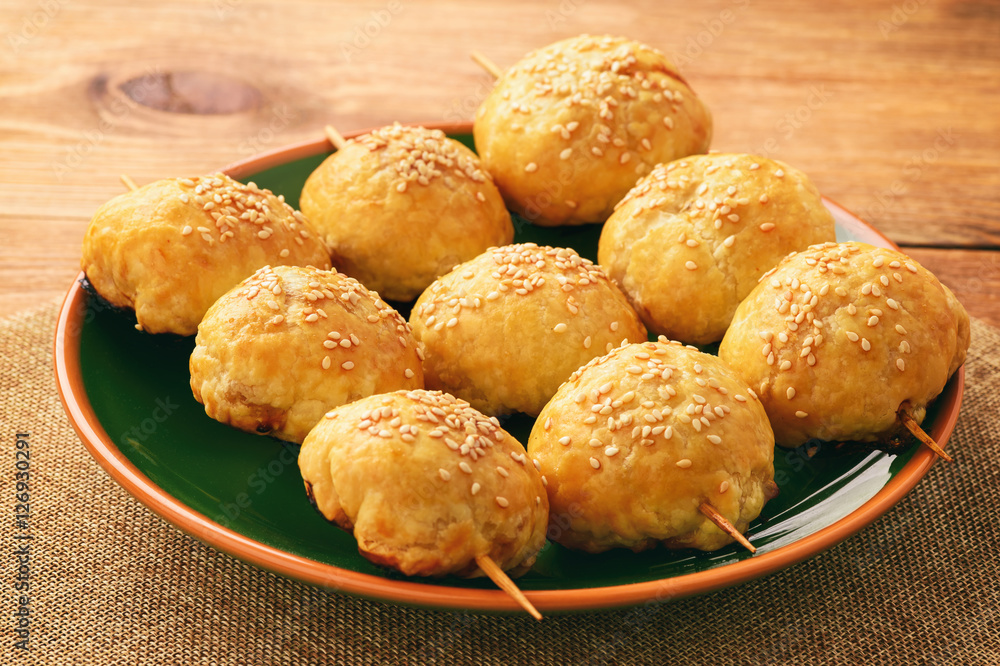 Puff pastries with meat (samosa) - traditional uzbek and indian pasrty. Puff pastries with meat (samosa) - traditional uzbek and indian pasrty.