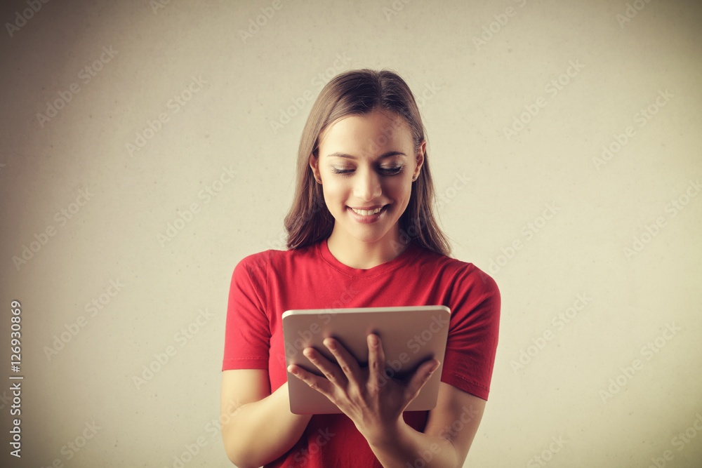 Fototapeta premium Tapping on a tablet