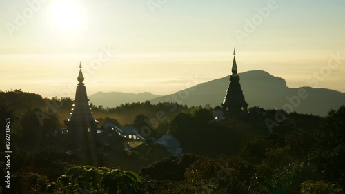 Timelapse morning landscape of two pagodas Noppamethanedol & Noppapol Phumsiri in an Inthanon mountain, Chiang Mai, Thailand.