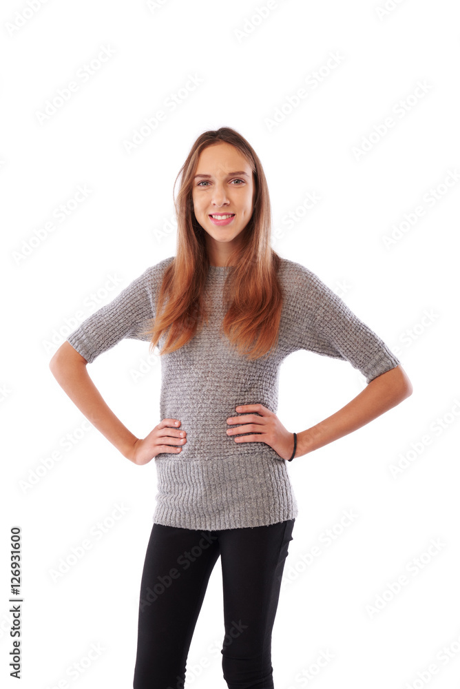 A portrait of delighted young girl looking at camera and keeping A portrait of delighted young girl looking at camera and keeping