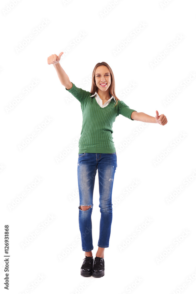 Happy confident girl showing thumbs up gesture over white backgr Happy confident girl showing thumbs up gesture over white backgr