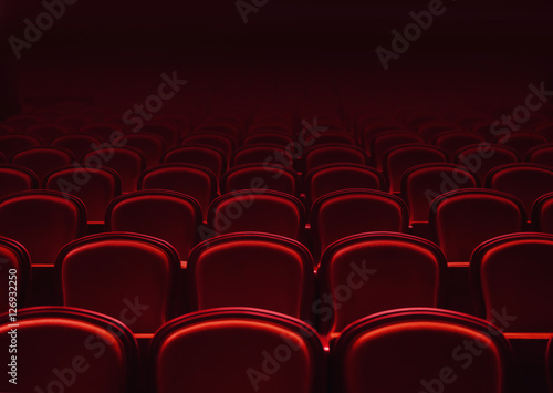 red cinema auditorium chairs.