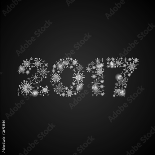 2017 consisting of snowflakes on black background