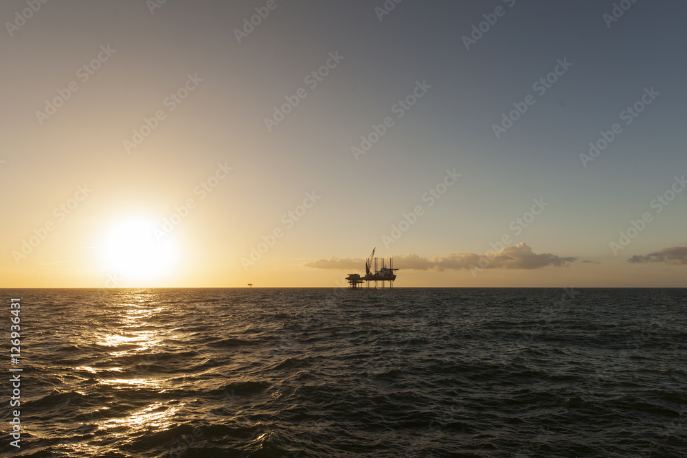 Jack Up heavy lift ship at sunset