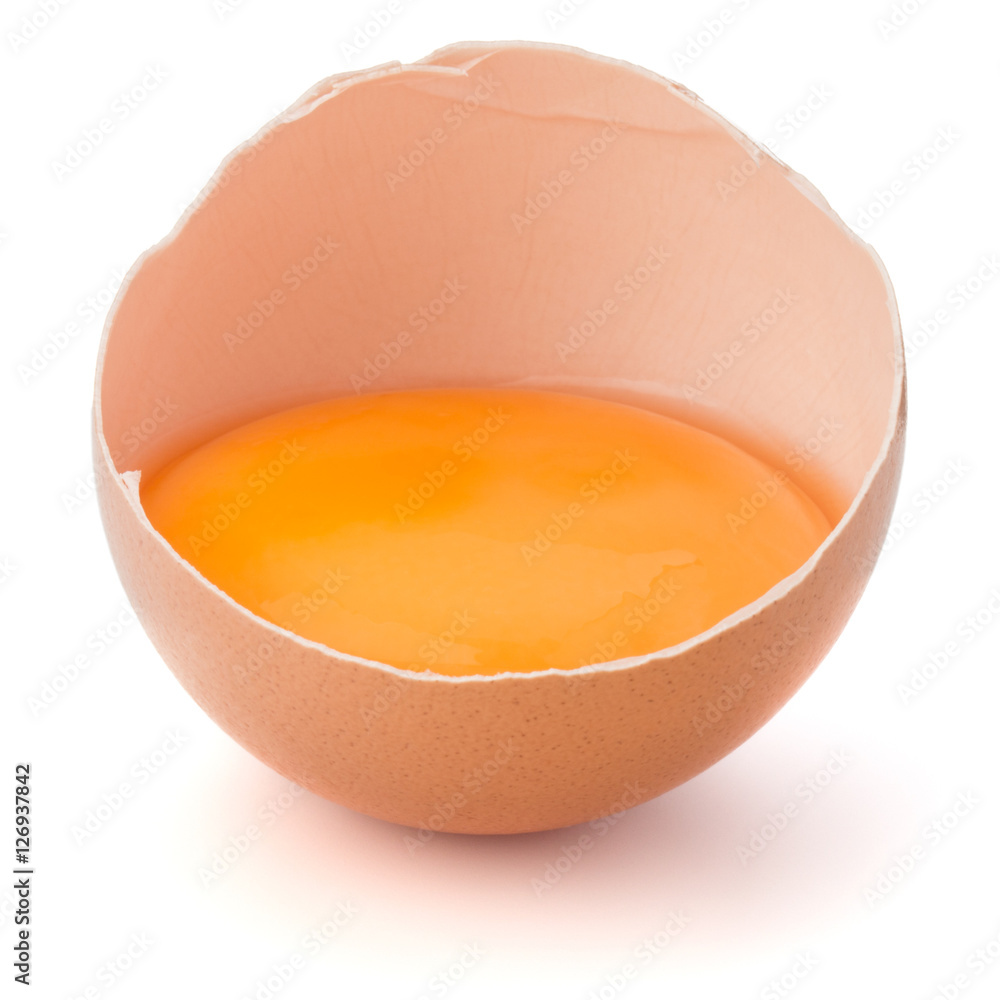 Broken egg in eggshell half isolated on white background cutout Broken egg in eggshell half isolated on white background cutout