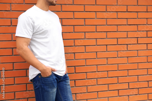 Young man in blank t-shirt ...