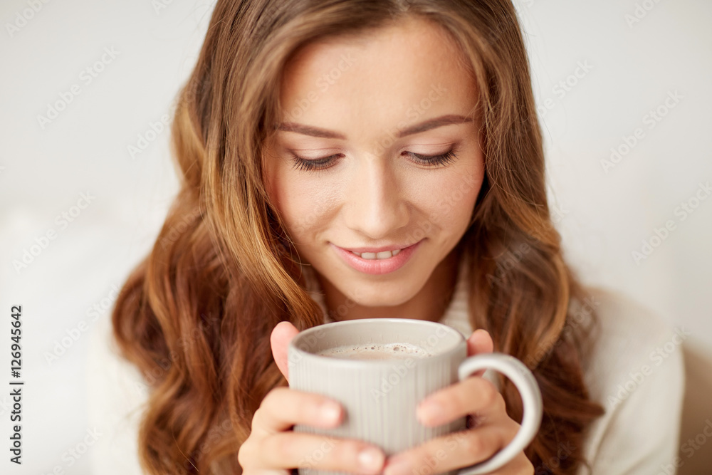 close up of happy woman with coffee cup at home close up of happy woman with coffee cup at home