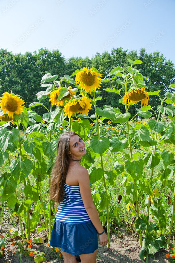 © altana_studio - smiling pretty girl in sunflower © altana_studio - smiling pretty girl in sunflower