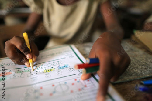 Schoolchildren. Primary School Adjallé. Lomé. Togo. / Cours de mathématiques. Etablissement scolaire. Lomé. Togo. photo