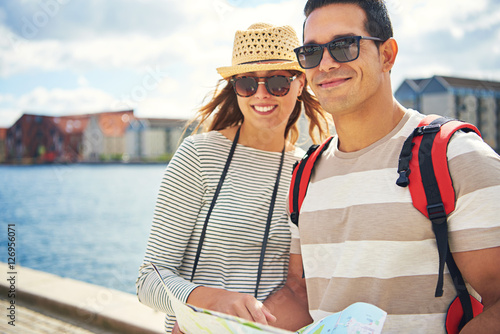 Happy young couple on a backpacking holiday