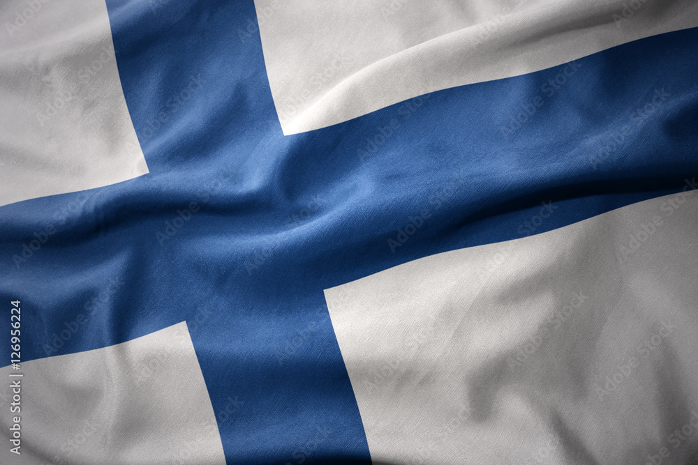 Obraz premium waving colorful flag of finland.