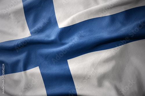 waving colorful flag of finland. photo
