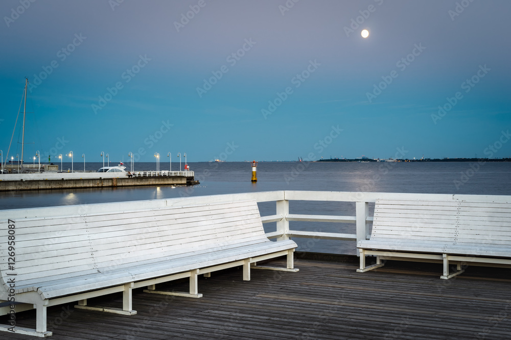 Pleasant evening with full moon at Sopot Pier, Pomeranian, Poland