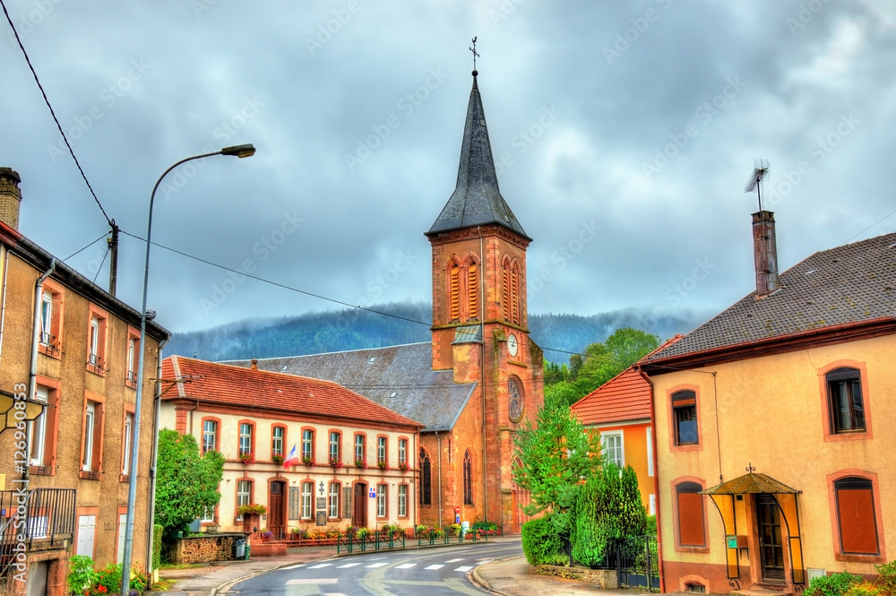 Obraz premium La Petite-Raon, town hall and the church. Vosges Department, France