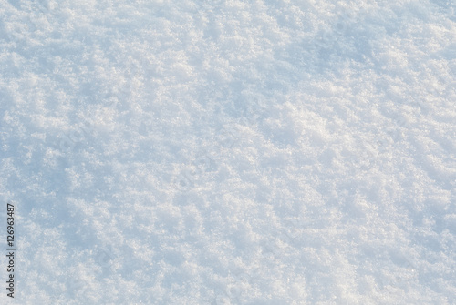 Snow surface with snowflakes closeup