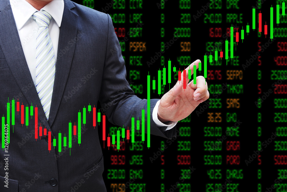 Businessman hand touching Candlestick Chart, investment concept Businessman hand touching Candlestick Chart, investment concept