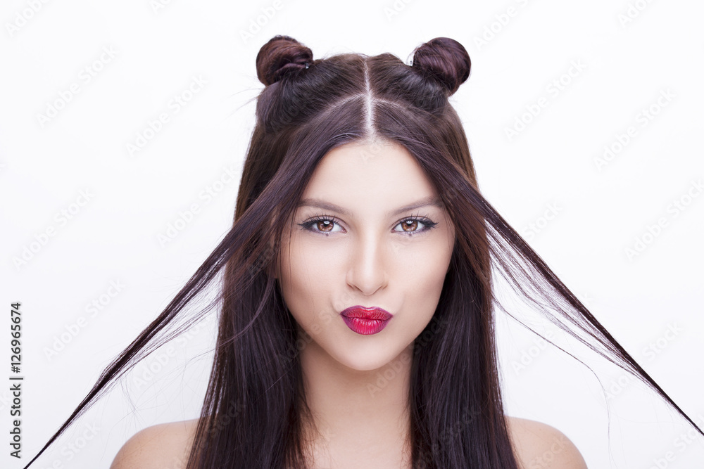 Young happy beautiful woman with bright makeup hairstyle with ho Young happy beautiful woman with bright makeup hairstyle with ho
