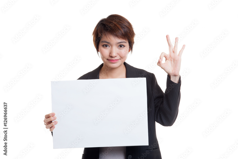 Young Asian business woman show OK with white blank sign. Young Asian business woman show OK with white blank sign.