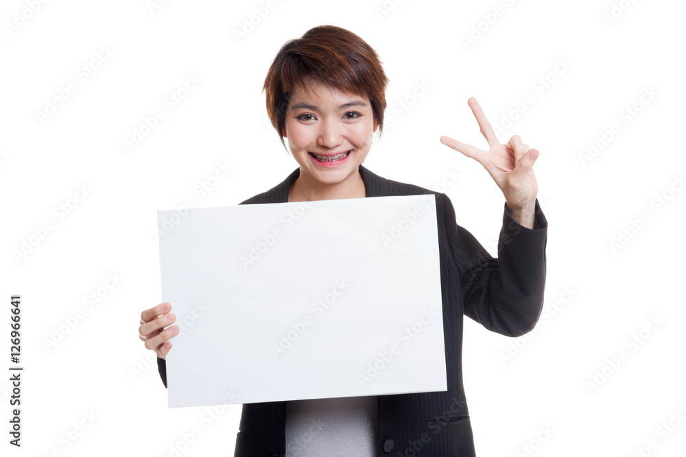 Young Asian business woman show victory sign with blank sign. Young Asian business woman show victory sign with blank sign.