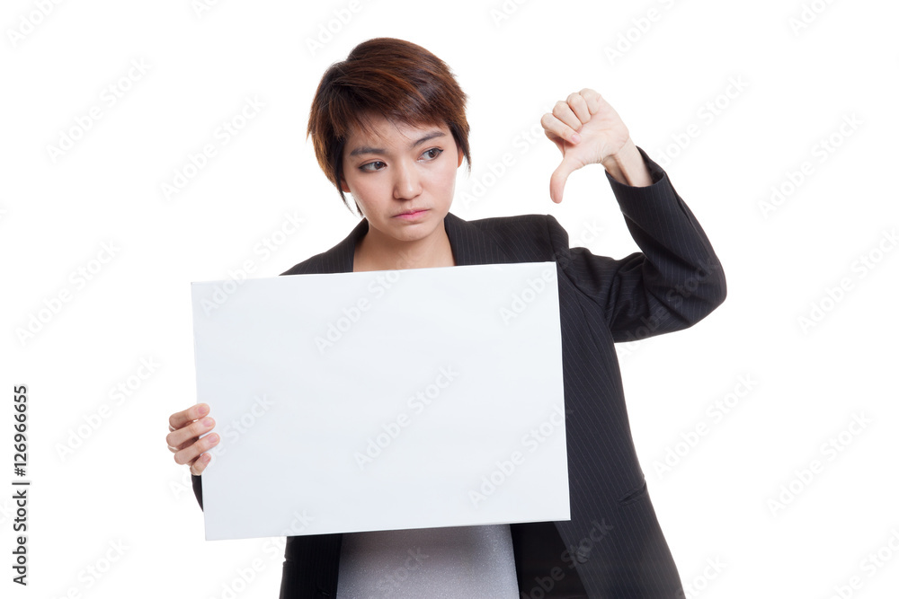 Young Asian business woman show thumbs down with white blank si Young Asian business woman show thumbs down with white blank si