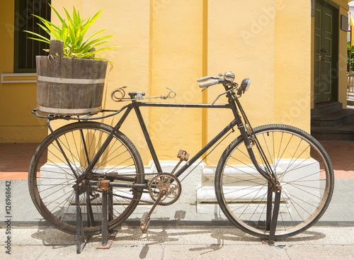 Vintage bicycle on the street of old town.
