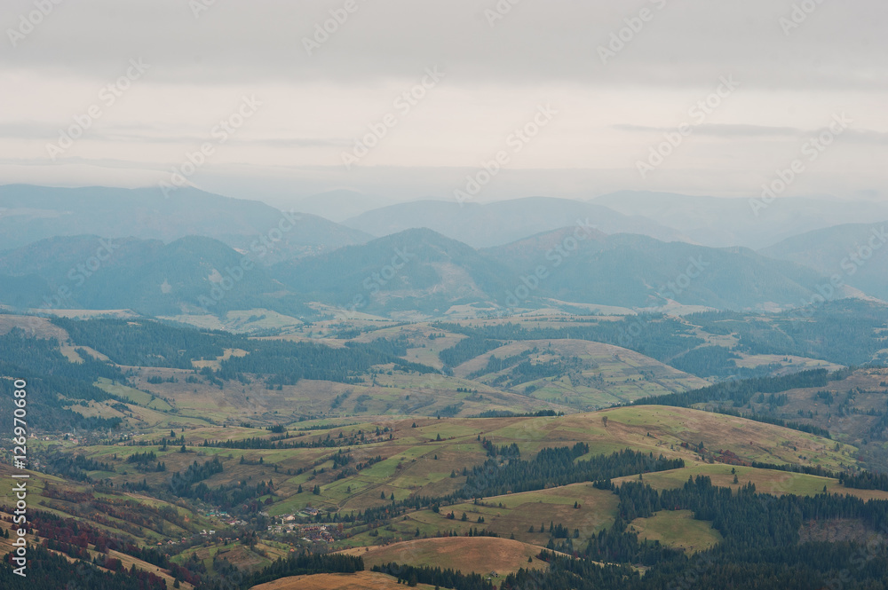 Landscape of small village on forest at Carpathian mountains. Landscape of small village on forest at Carpathian mountains.
