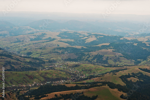 Landscape of small village on forest at Carpathian mountains. © AS Photo Family