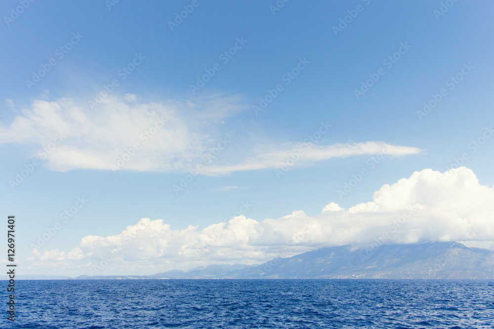 Fototapeta premium blue sea and clouds on sky