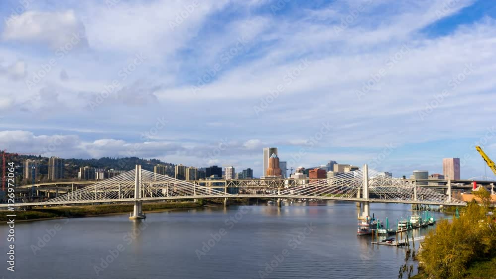 Time lapse movie of white clouds and blue sky over downtown city auto traffic on Marquam bridge and Tillikum Crossing over Willamette River in Portland Oregon 4096x2304 4k uhd Time lapse movie of white clouds and blue sky over downtown city auto traffic on Marquam bridge and Tillikum Crossing over Willamette River in Portland Oregon 4096x2304 4k uhd