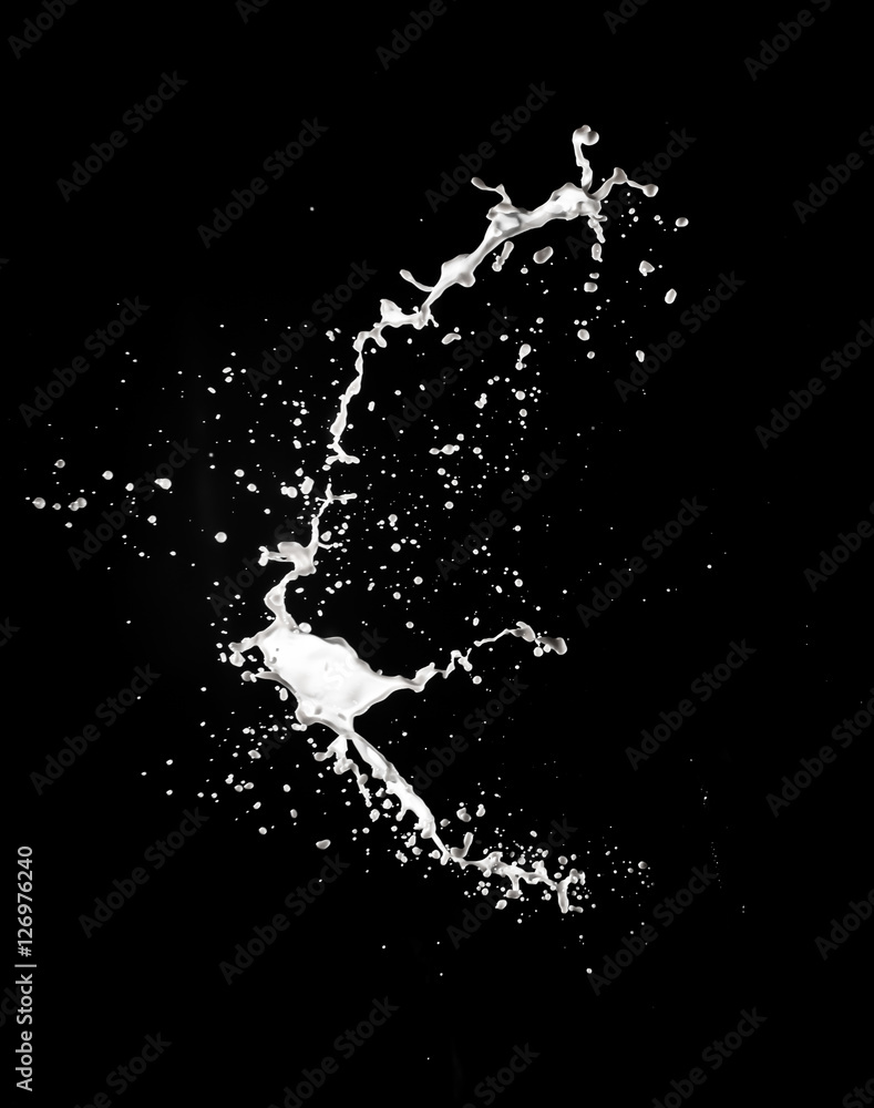 Obraz premium Milk splash, isolated on black background