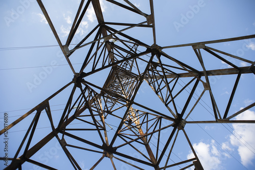 High voltage electric pylon . View from below through.