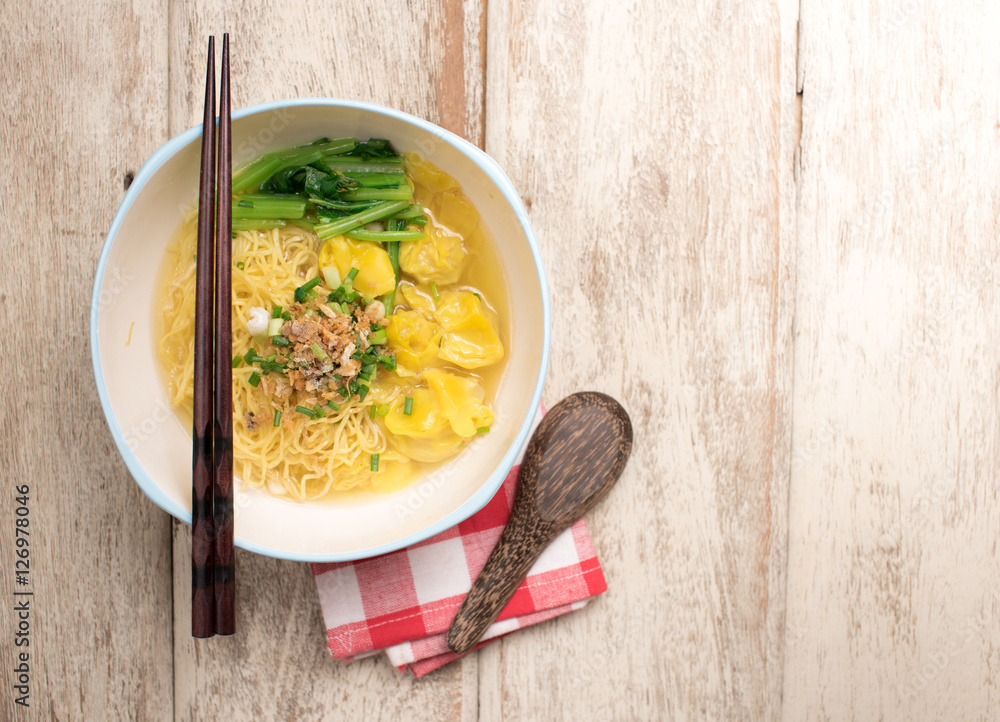 Egg noodle soup on tabel wood Stock Photo | Adobe Stock