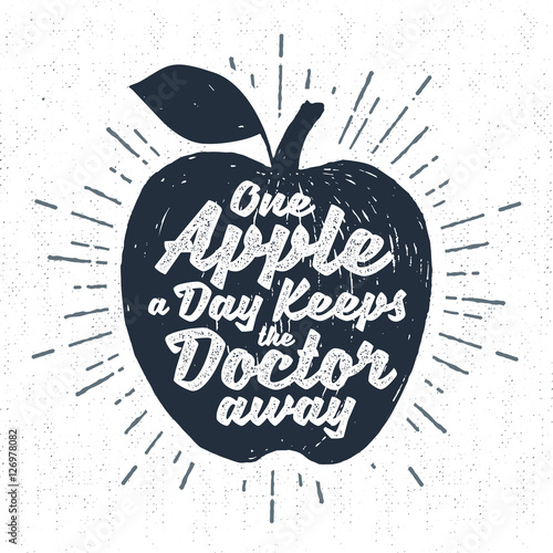 Hand drawn label with textured apple vector illustration and "One apple a day keeps the doctor away" lettering.
