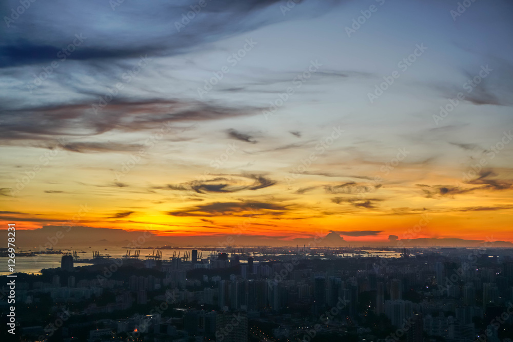 Sunset above big city