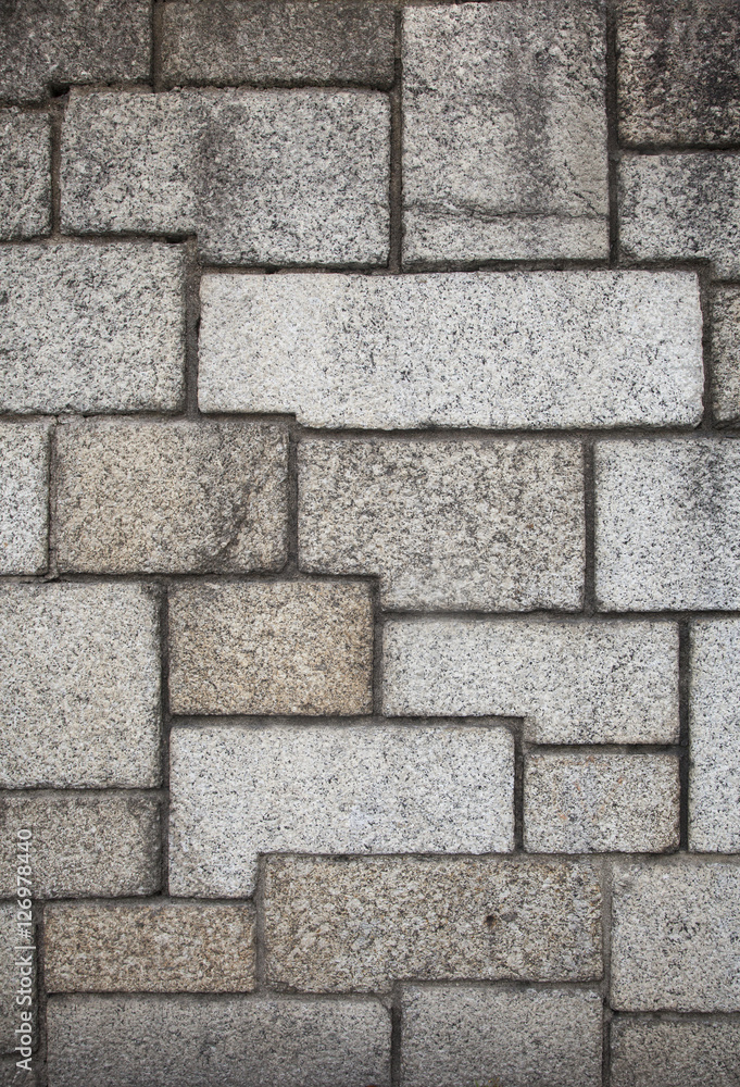 Naklejka premium Rustic stones wall background.