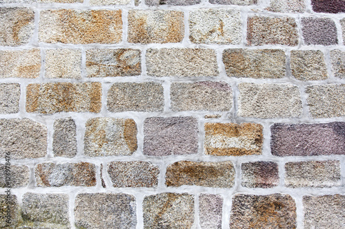 Colorful stone wall background.