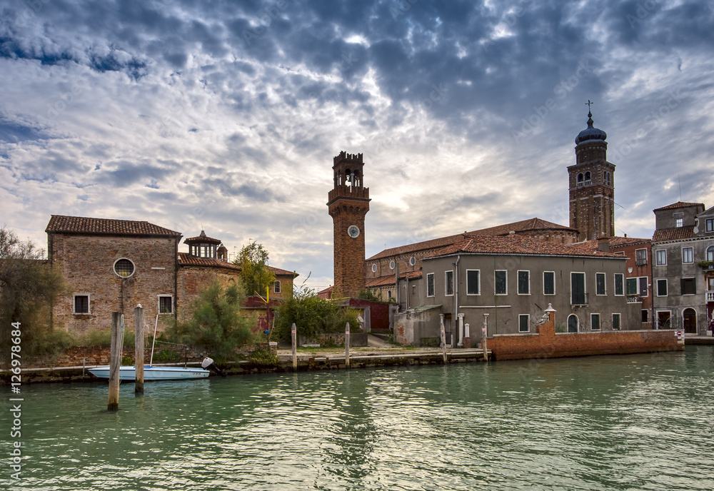 Clock tower, Campo Santo Stefano on the Murano island. Venice, Italy