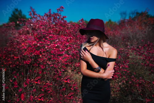 Woman Outdoors Portrait, Young Lady in hat with brim photo