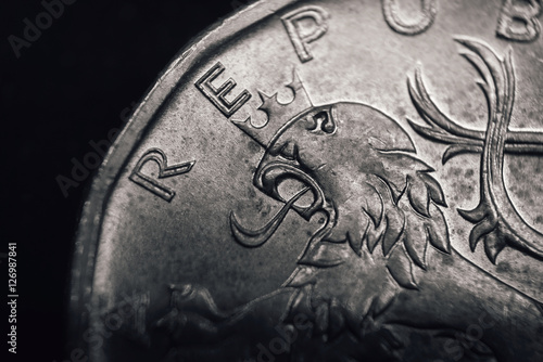 Bohemian heraldic lion on Czech koruna coin. Financial concept.