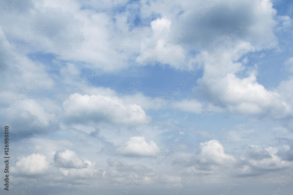 Fluffy white clouds in blue sky Fluffy white clouds in blue sky