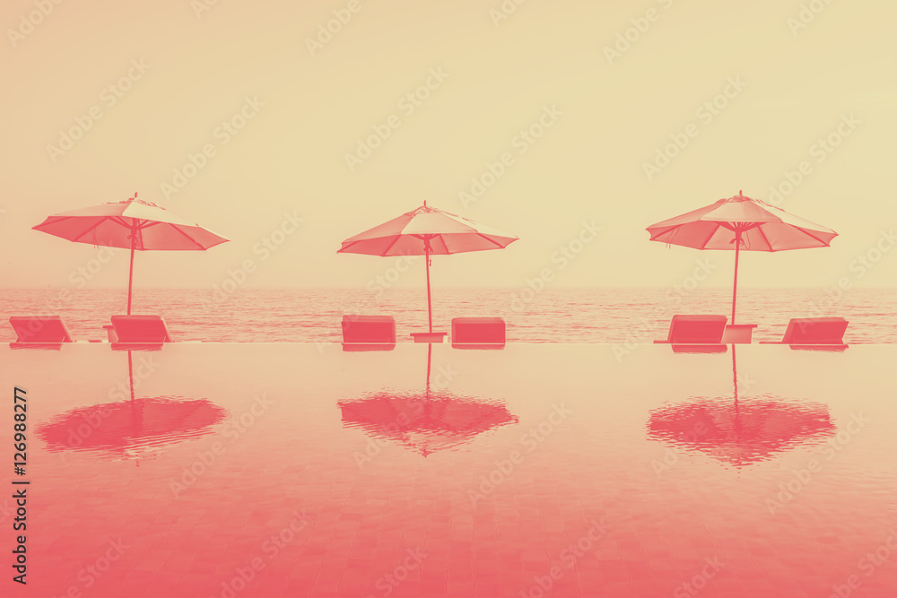 Beach umbrellas on an infinity pool