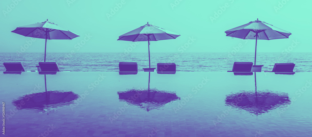 Beach umbrellas on an infinity pool