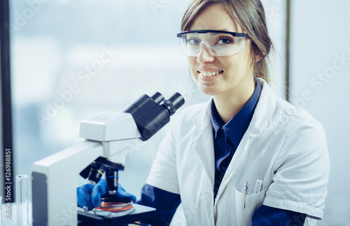 Young scientist working in lab
