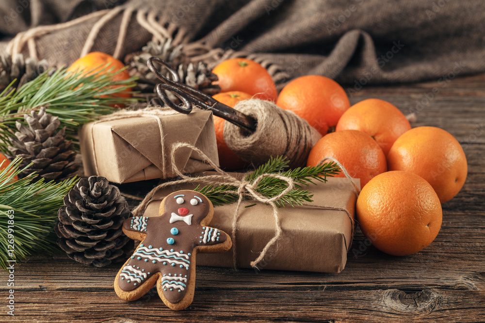Gift concept. Gingerbread man cookies with icing decoration and Gift concept. Gingerbread man cookies with icing decoration and